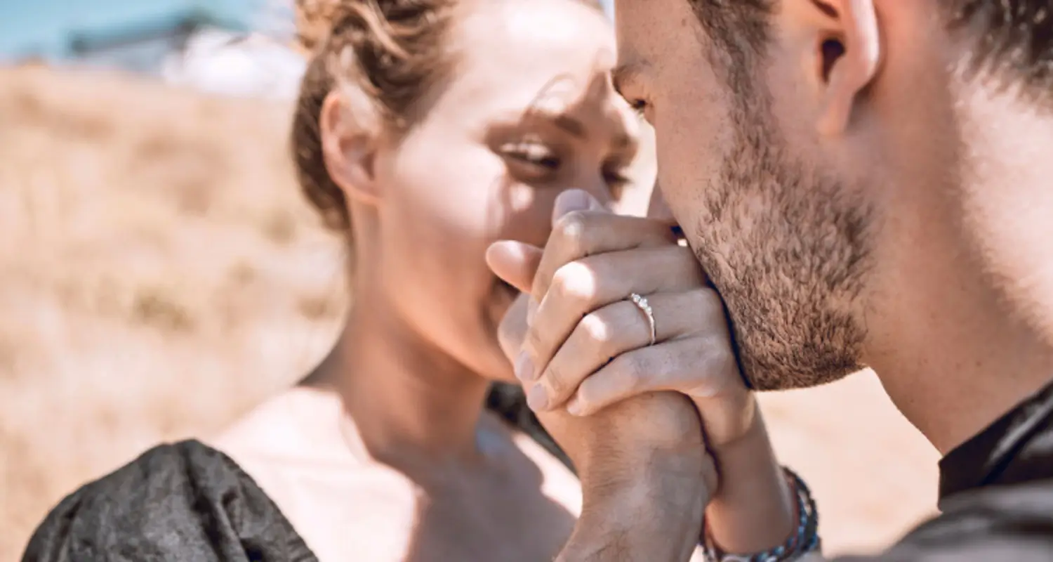 Happy sober couple hold hands in a face-to-face embrace